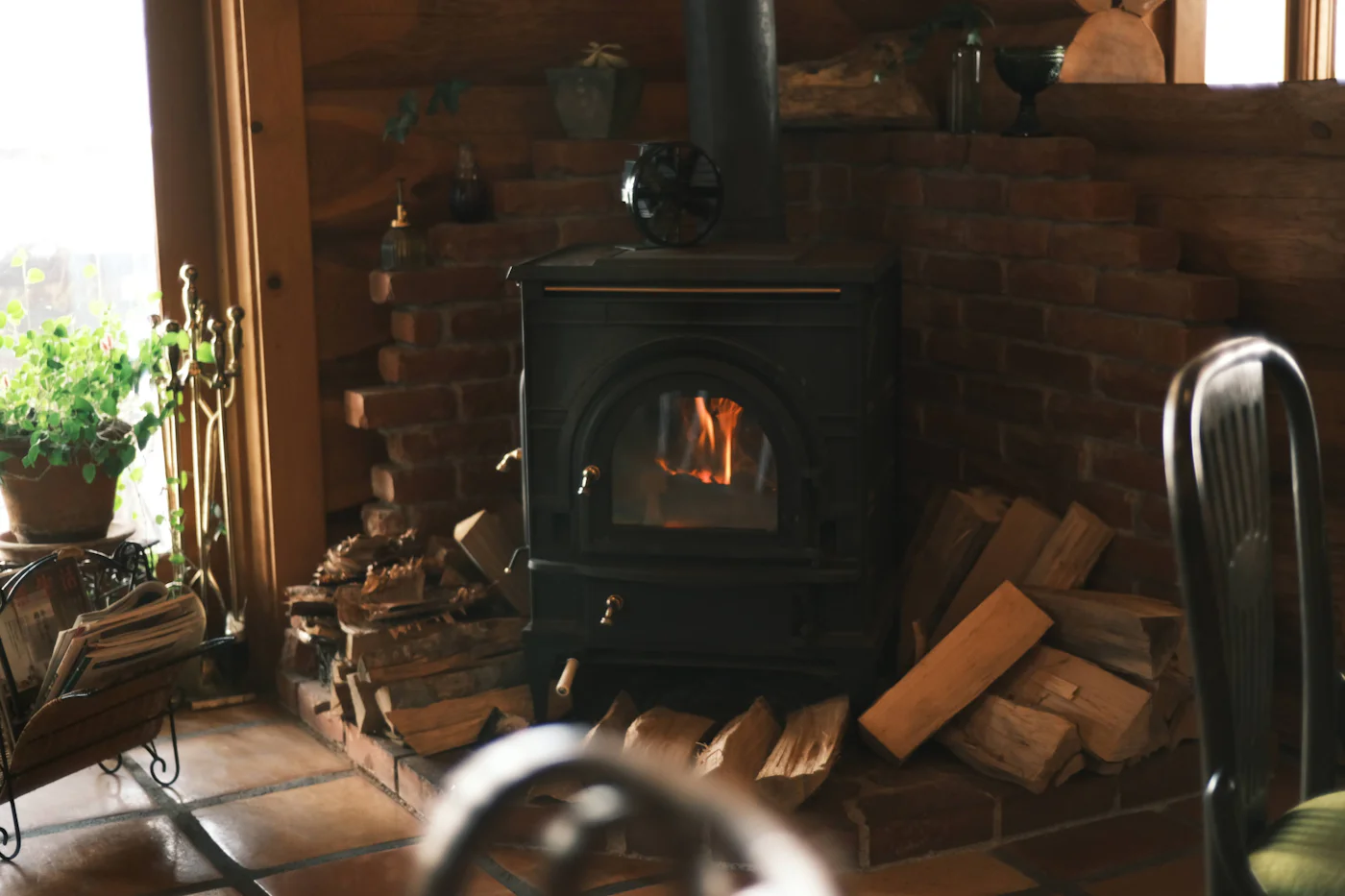 Wood-burning stove in the corner of the sitting room